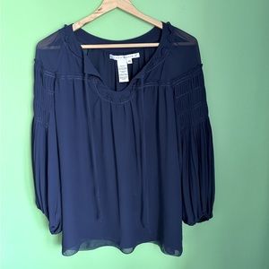 Beautiful navy blue blouse, flowing material with unique sleeves